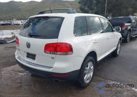 2006 Volkswagen Touareg V8 z USA, uszkodzony, nr VIN WVGZM77L06D027930